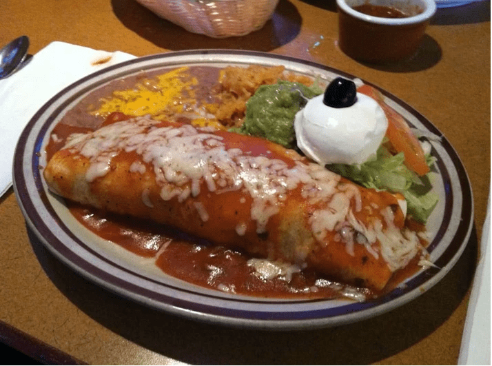 Burrito meal with rice and beans.